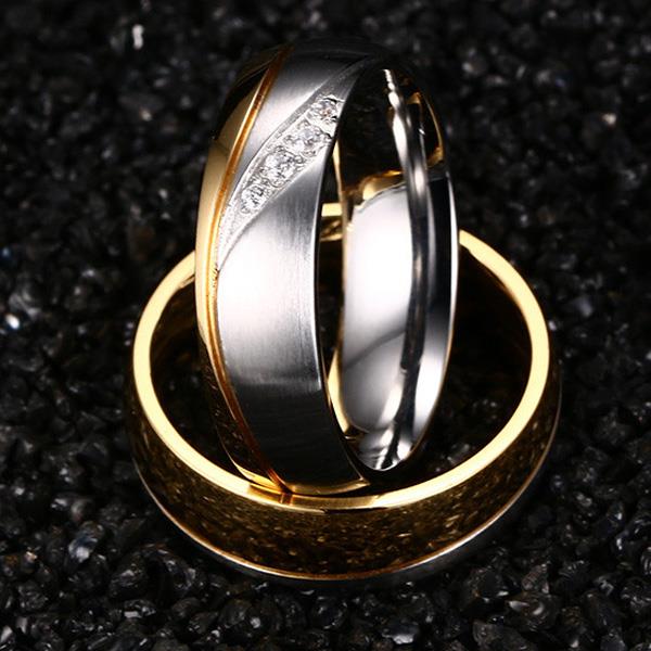 Обручальные кольца парные с бриллиантами из золота 585 пробы