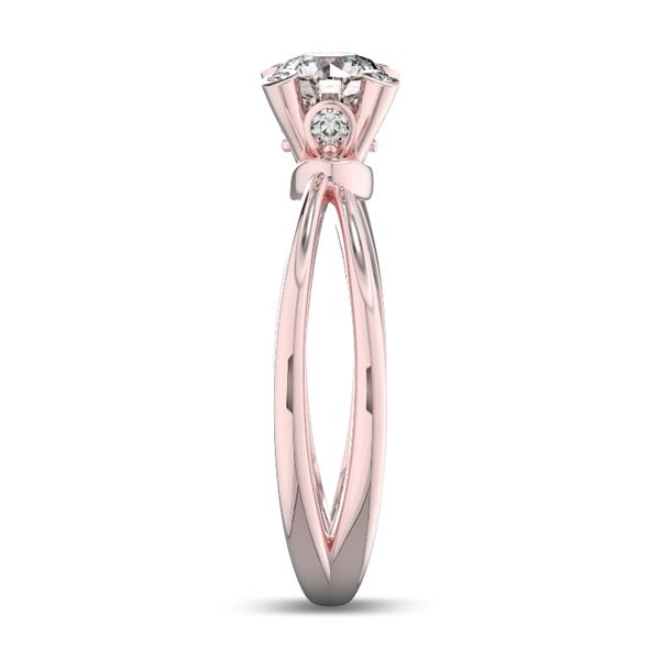 Помолвочное кольцо 1 бриллиантом 0,5 ct 4/5 и 8 бриллиантами 0,12 ct 4/5 из розового золота 585°