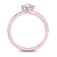 Помолвочное кольцо с 1 бриллиантом 0,45 ct 4/5  и 20 бриллиантами 0,12 ct 4/5 из розового золота 585°