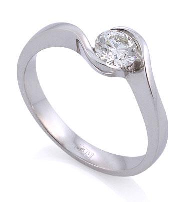 Помолвочное кольцо "Нежность" из белого золота 750 пробы с 1 бриллиантом 0,55 карат